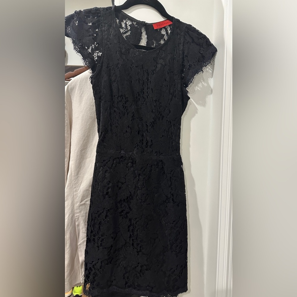 Black lace dress with open back